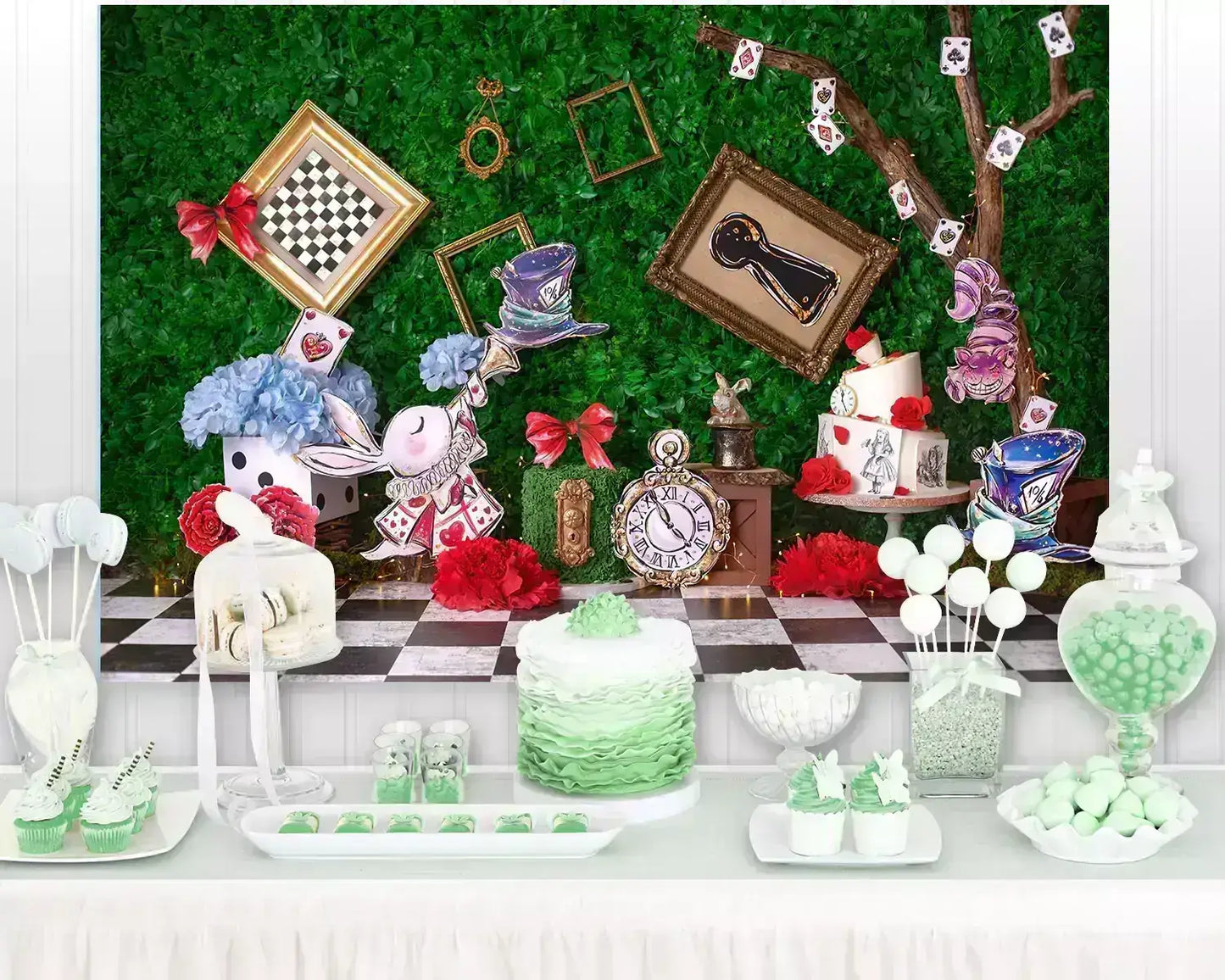 Colorful whimsical dessert display inspired by Wonderland, featuring cakes, candies, and themed decor.
