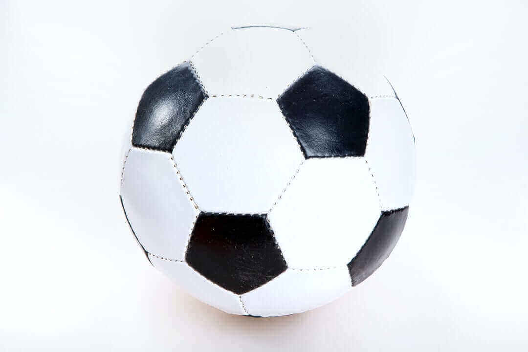 High-quality soccer ball for all age groups, made without artificial materials, featuring classic black and white design.