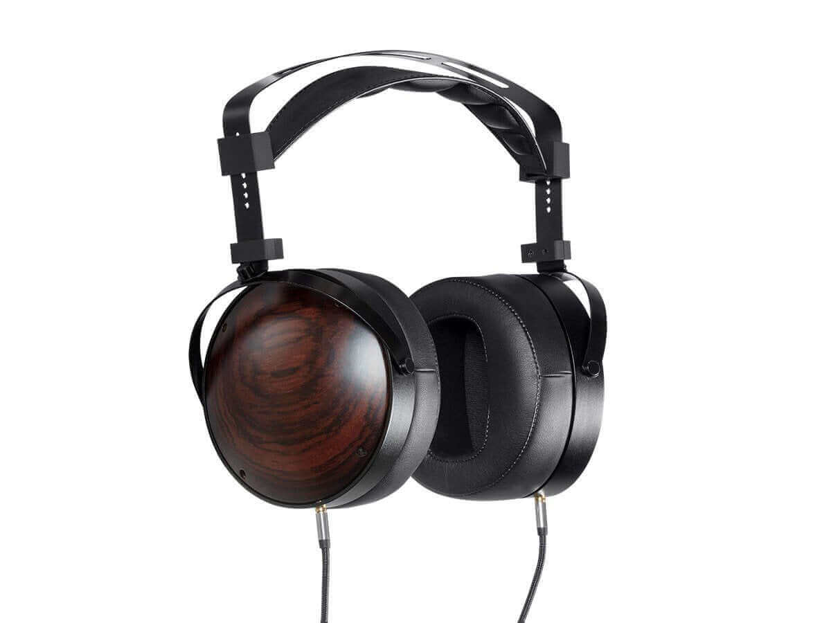 Monolith M1060C planar headphones with wood grain ear cups and leather headband for audiophiles