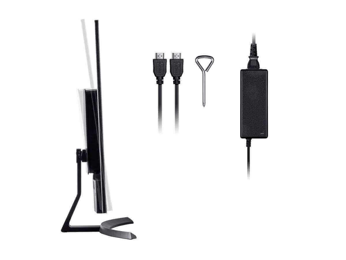 Side view of a 4K HDR monitor with cables and power adapter, showcasing its ultra slim design and included accessories.